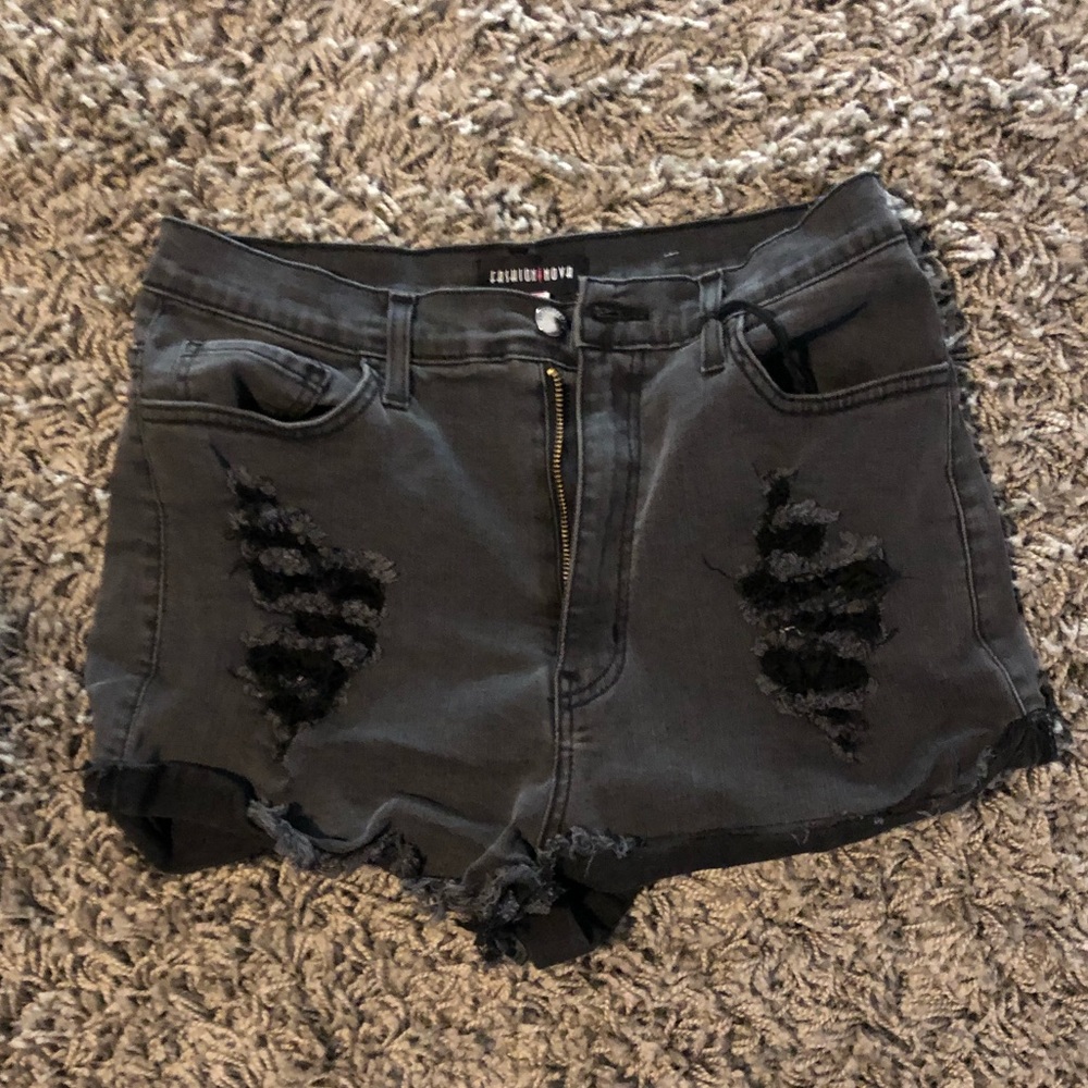 Ripped black denim shorts